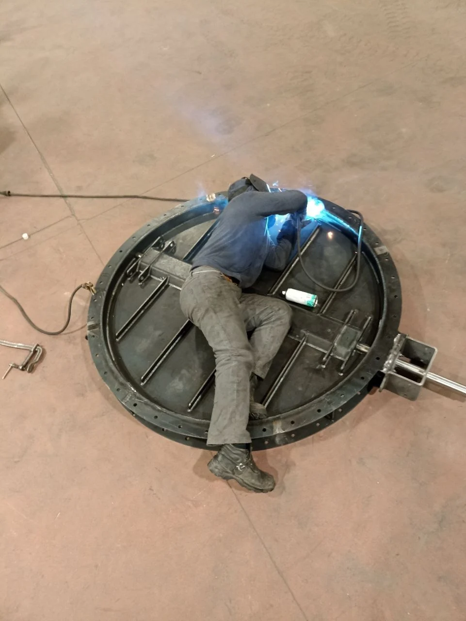 Fabrication work on a large circular steel assembly